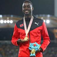 Men's 200m gold medalist Trinidad and Tobago's Jereem Richards on the podium at Carrara Stadium during the 2018 Commonwealth Games on the Gold Coast,Australia, Friday, April 13,2018.