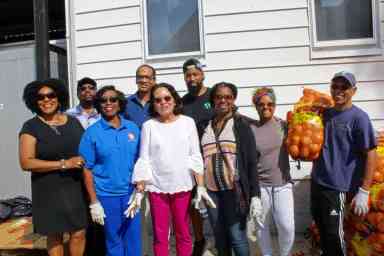 Guyana’s First Lady volunteers at Queens food pantry