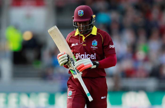 West Indies' Rovman Powell looks dejected after losing his wicket against England. 