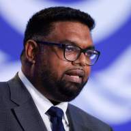 Guyana's President Mohamed Irfaan Ali speaks during the UN Climate Change Conference (COP26) in Glasgow, Scotland, Britain, Nov. 2, 2021.