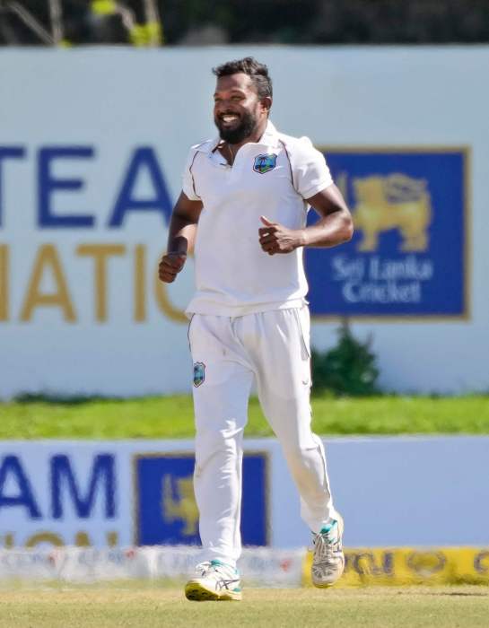 West Indies bowler Veerasammy Permaul celebrates taking the wicket of Sri Lanka's Angelo Mathews during the fourth day of their second test cricket match in Galle, Sri Lanka, Thursday, Dec. 2, 2021.