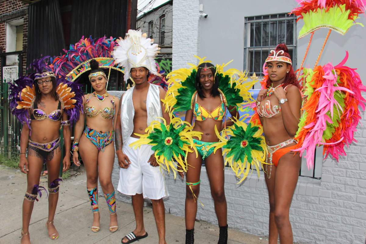 Models in Branches and Associates' band "Carnival is Color. From left: Shantel Chambers portrays 'Power, Strength and Royalty,' Teshanna Thorman portrays 'Colors of the Band,' David Brown portrays 'Innocence,' Kathline St. Fleur portrays 'Sunset,' and Selena Thorman portrays 'Seduction.'