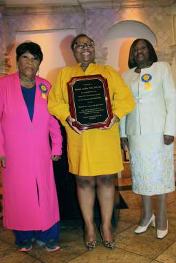 Donna Anglin receives award from Dr. Hyacinth Martin, left, and Dr. Virginia Bernard.