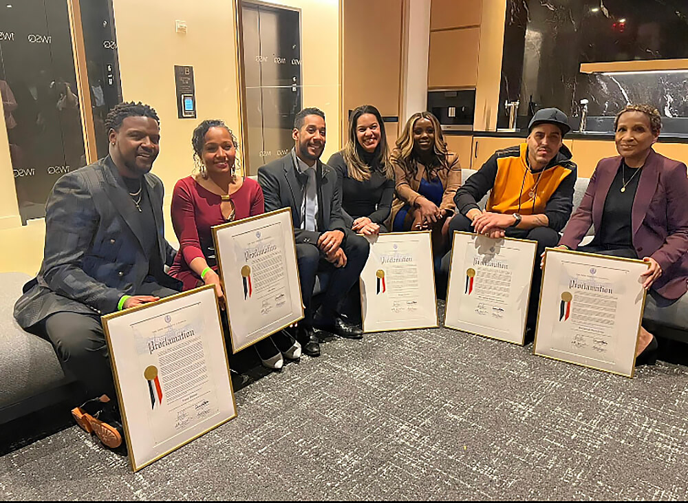 From left: Venny Etienne, fashion designer and CEO of Levenity Collection, LLC, Alba Mota, community and cultural activist, Brooklyn Borough President Antonio Reynoso, ﻿Wendy Garcia, deputy commissioner, New York City Council Member, Farah N. Louis, Max Agenda Santos from the Aventura Band and Rosemonde Pierre-Louis, Public Sector Leader and Chairperson of Haitian Roundtable (HRT).