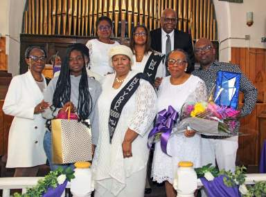 Front row from left: Sis. Marlene Ferguson; Min. Cynthia Grant's grand daughter Kyasia Shawell; Sis. Lynn Malloy, UWF president; Min. Cynthia Grant; and Min. Grant's son, Roger Grant.  Back row from left, Sis. Gillian Prince, Kim Jackson and pastor, the Rev. Roger Jackson.