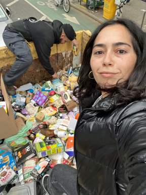 Soleil Sabalja doing a dumpster dive. 