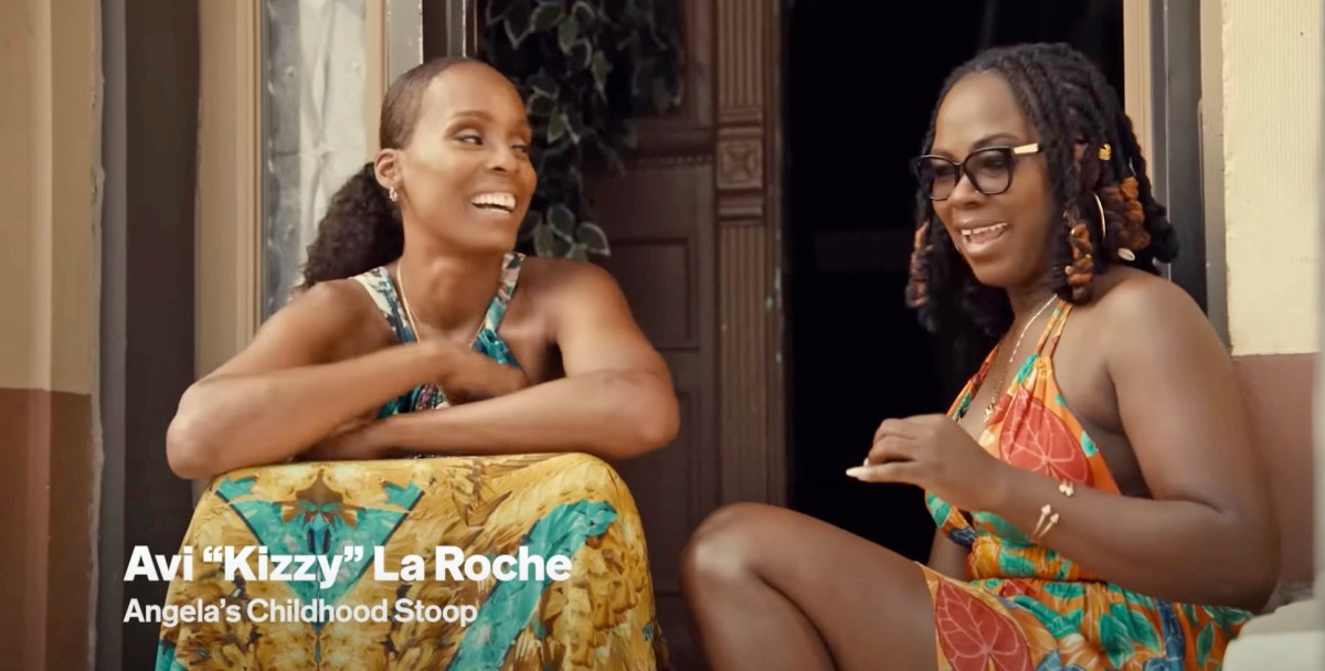 Screenshot of Angela Hunte sitting on a stoop with her friend on her stoop where she grew up in Flatbush, from her video in the NYC Tourism Local Legends Series, which was released on May 25.