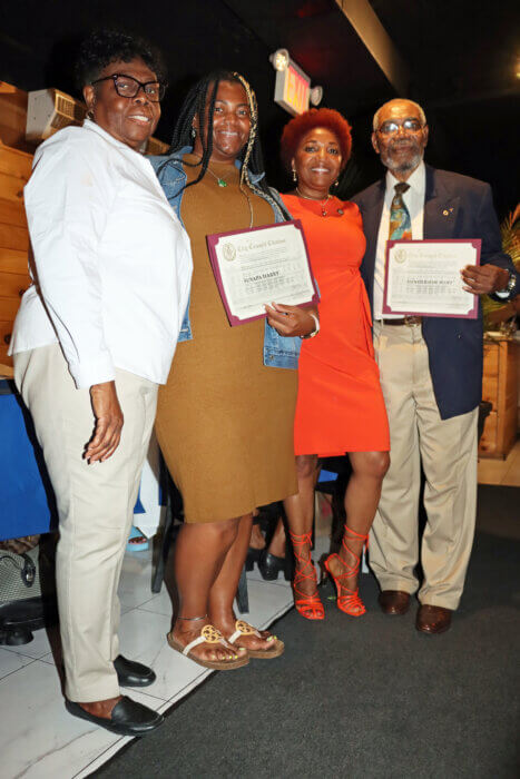 Councilmember Mercedes Narcisse, third from left, presents certificates to two Lions, flanked by Brooklyn Canarsie Lions President Jean Joseph, left.