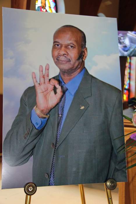 Portrait of Winston Soso posted next to casket. Soso, known as the "Rolls Royce" of Calypso, died in 2021. His funeral took place at St. Gabriel's Episcopal Church on Hawthorne Street in Brooklyn.