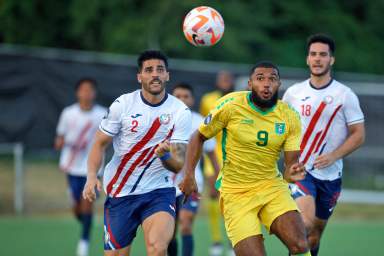 BASSETERRE, SAINT KITTS AND NEVIS. Oct.14: Nicolas Cardona #2 of Puerto Rico and Deon Moore #9 of Guyana during the League B Group D match between Puerto Rico vs Guyana in the Concacaf Nations League held at the SKNFA Technical Center, Basseterre, Saint Kitts and Nevis.