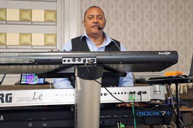 Adrian Bailey on keyboards at SVG 44th Anniversary Independence Ball.