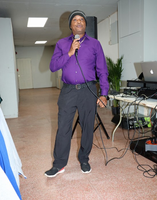 SCEC Principal Ray Adolphus Lawrence, Sr. addresses reception for Belizean, Vincentian and Kittitian teams that competed in the Penn Relays Carnival, at the Calabash Restaurant and Lounge on Lancaster Avenue in Philadelphia.