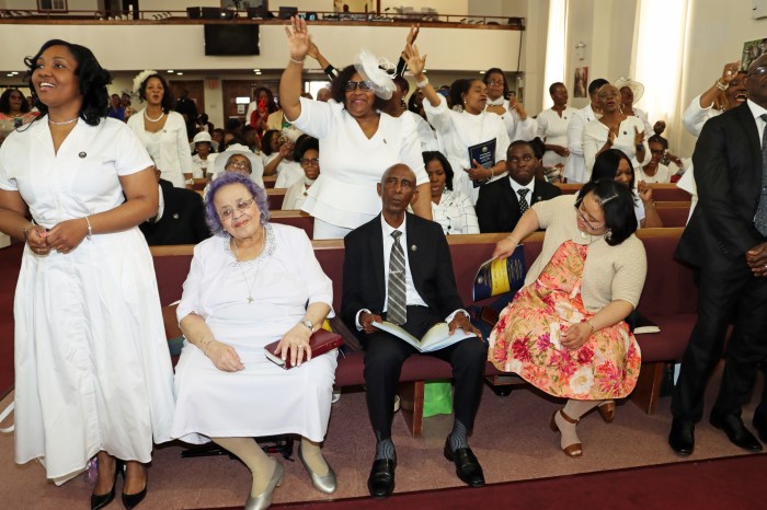 Front pew: Pastor the Rev. Dr. Roxie Morris's mother, Rosemarie Bobb, second from left, with Pastor Morris's husband, Stanley Morris, third from left, and members of Hope Restored Tabernacle, Inc. (HRT) in background.