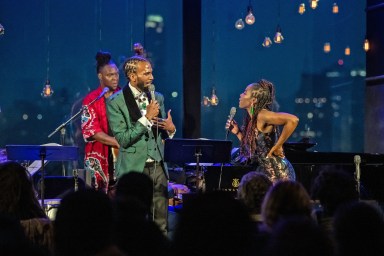 Brandon Bain performs with Pauline Jean, a vocalist of Haitian descent.