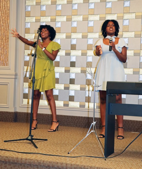 Sisters Jaidyn, 14, and Jasmyn Moodie, 18, sing "Stand Up!"