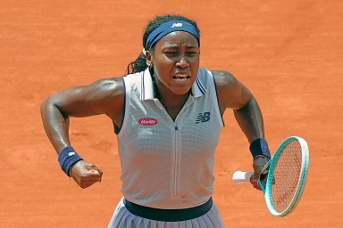 Coco Gauff of the U.S. celebrates winning her quarterfinal match of the French Open tennis tournament against Tunisia's Ons Jabeur at the Roland Garros stadium in Paris, Tuesday, June 4, 2024.