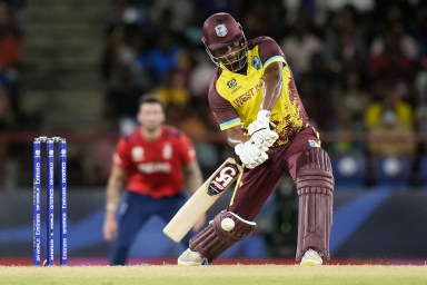 West Indies' Johnson Charles bats during the men's Twenty20 cricket match between England and the West Indies at Darren Sammy National Cricket Stadium in Gros Islet, St. Lucia on June 19, 2024.
