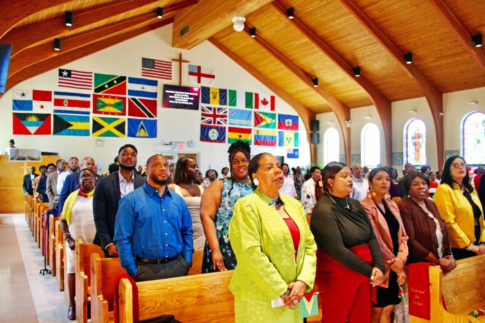 Set against a backdrop of Caribbean, and Guyana flags, a Guyanese and friends congregation sang lustily during a 58th Independence Anniversary service at St. Gabriel's Episcopal Church in Brooklyn, on Sunday, May 26, Independence Day.