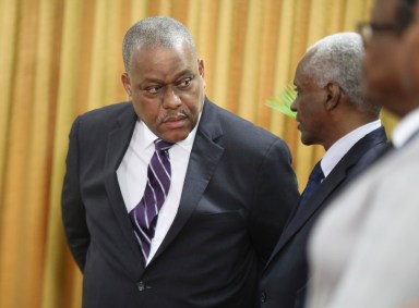 New Haitian Prime Minister Garry Conille, left, speaks to the president of the council Edgard Leblanc Fils during his swearing-in ceremony in Port-au-Prince, Haiti, Monday, June 3, 2024.