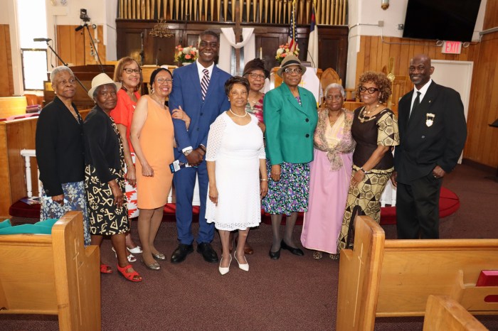 Attorney Kenneth Gayle, fifth from left, with members of Central Brooklyn Lions Club, of which his late mother was a former president, after addressing the congregation on Sunday at Fenimore Street United Methodist Church in Brooklyn.
