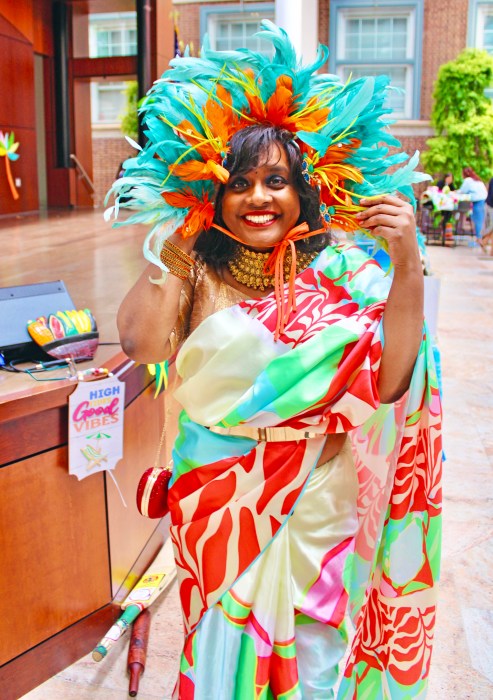 Ash, founder of Green Fashion, Art & Design Museum wearing a carnival costume headpiece at the first Caribbean American Heritage celebration hosted by the Queens County Supreme Court, Criminal Term's Equal Justice Committee, in partnership with Borough President Donavan Richards, in Queens on June 11.