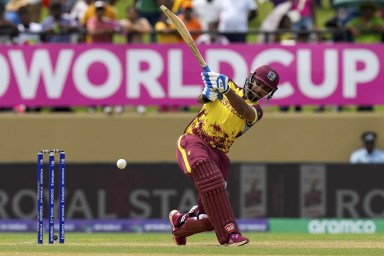West Indies' Nicholas Pooran plays a shot against Paupa New Guinea during an ICC T20 World Cup Cricket match played at Guyana National Stadium in Providence, Guyana, Sunday, June 2, 2024.