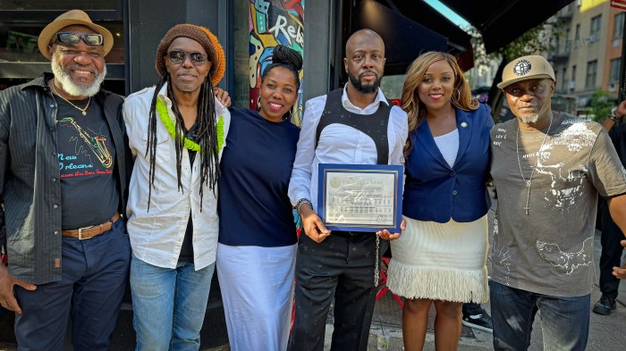 Wyclef Jean honored with a City Council Proclamation, from left: Jensen Desrosiers of JD & Associates and owner of Anba Tonel; Debbi Esther Louis, director of NYC Intergovernmental Affairs for the Executive Chamber; Wyclef Jean; and Council Member Farah N. Louis with supporters.