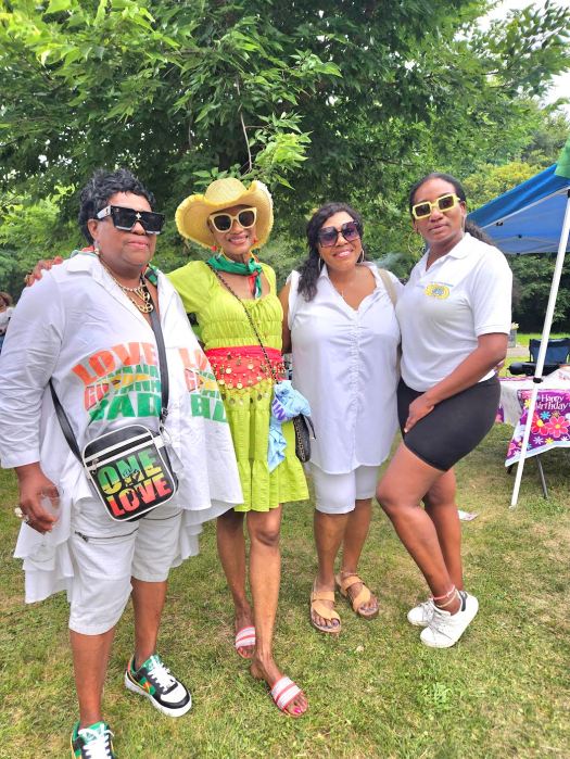 Picnickers, from left, Lady Ira Lewis, president of the Guyana America Heritage Inc. New Jersey, Caribbean Life contributor Tangerine Clarke, Sherif Barker, Community Board 17 district manager, and member of WIADCA, and Rhonda, of the Queens Lions Club.