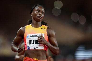 Athletics - Diamond League - Monaco - Stade Louis II, Monaco - July 12, 2024 Saint Lucia's Julien Alfred reacts after winning the women's 100m