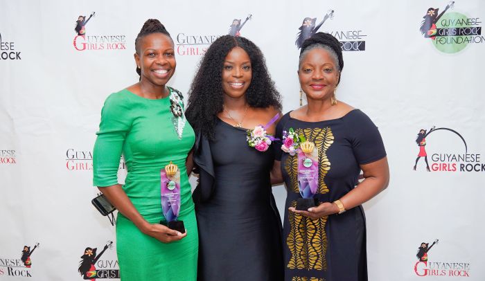 Women of Inspiration Award Honoree Alliann Pompey (left), Guyanese Girls Rock Foundation Founder Cloyette Harris-Stoute (center), and Women of Inspiration award Honoree Dr. Rosalind October (right). 