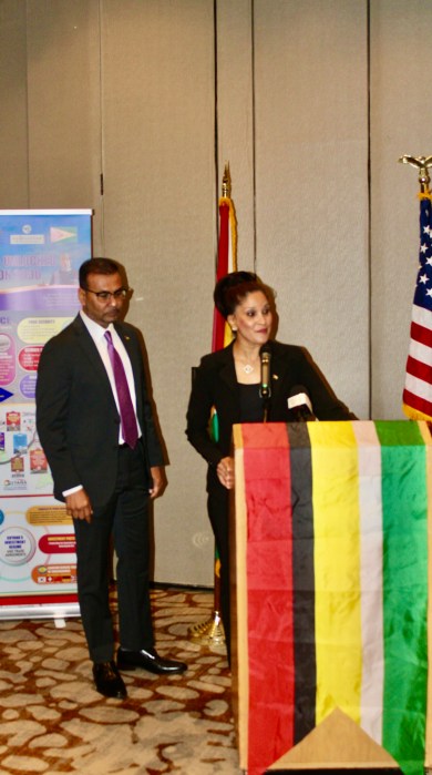 Robert Persaud, foreign secretary, Ministry of Foreign Affairs and International Cooperation, keynote speaker left, and Rolalinda Rasul, head of Diaspora who served as emcee at the podium, during the first Guyana Diaspora Job fair, in the United States, at the Laguardia Airport Marriott.
