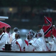 Paris 2024 Olympics - Opening Ceremony - Paris, France - July 26, 2024. Athletes of Trinidad & Tobago aboard a boat in the floating parade on the river Seine during the opening ceremony.