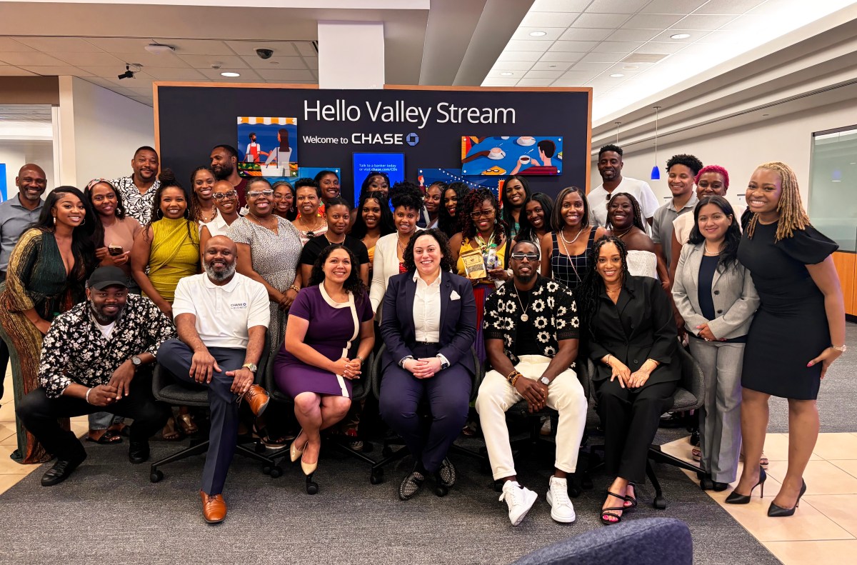 Attendees of the Chase Business mixer pose for a picture following the presentation.