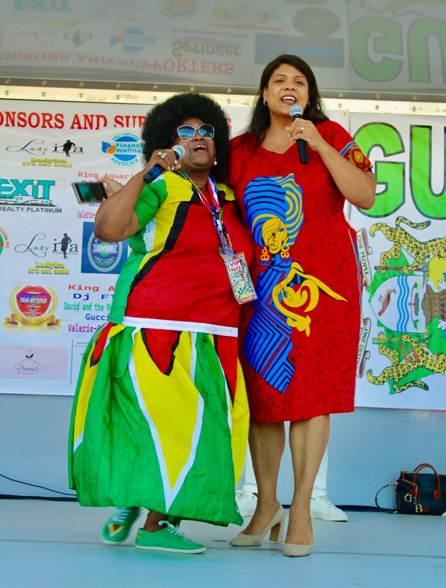 Senator Britnee Timberlake and Lady Ira Lewis, president of the Guyana American Heritage Foundation, Inc. on stage at the Annual Family Fun Day in Orange, NJ on July 14. The two danced to Bob Marley's hit “One Love.”