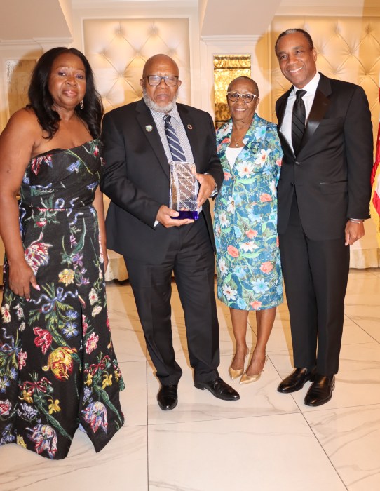 Dennis Francis, president of the 78th Session of the UN General Assembly, displays award, flanked by (from left): Justice Sylvia Hinds-Radix, Justice Cheryl Gonzales and Rudyard Whyte, Esq.