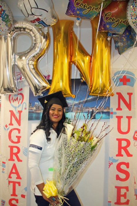 Nurse Somwattie celebrates after completing her studies to become a registered nurse.