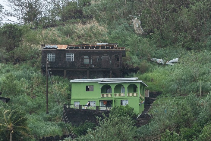 Houses damaged by Hurricane Beryl in Kingstown, St. Vincent and the Grenadines, Monday, July 1, 2024.