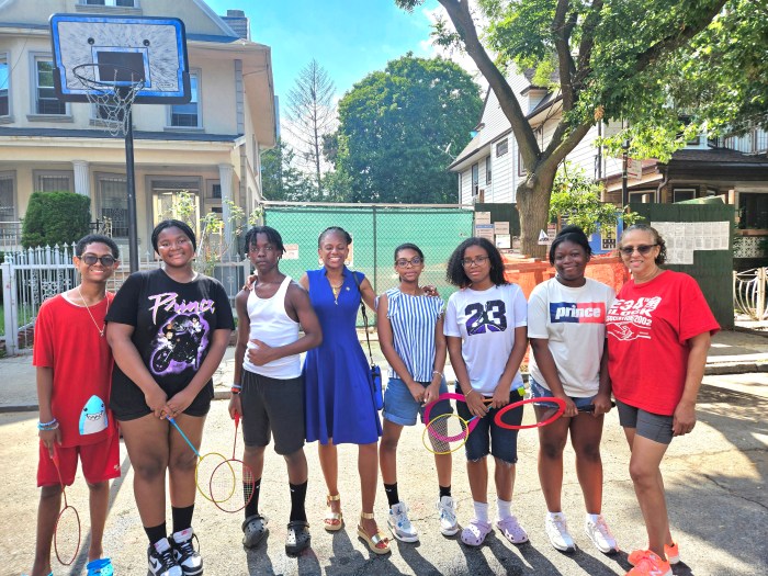 Assemblywoman Monique Chandler-Waterman; fourth from left; and President of the E 34th Street Block Association; Guyanese-born June Persaud extreme right with youths of E34th Street in East Flatbush, during the return of the community's Annual Block Party on July 13, after a hiatus due to the coronavirus pandemic.