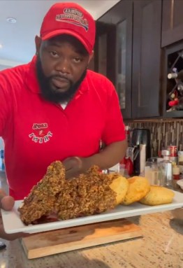 Chef Paul displays a meal from his kitchen.