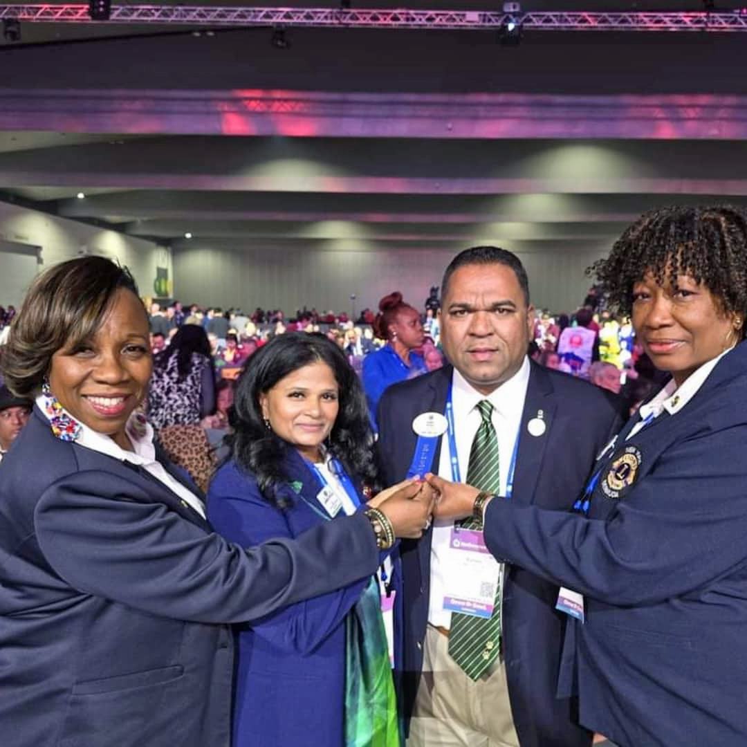 From left 1st Vice District Governor Jennifer Seymour Wright, Sandra Hitlall, Romeo HItlall, and Past District Governor Ingrid Andrew Campbell in Australia after he was sworn in as District Governor for Brooklyn & Queens.
