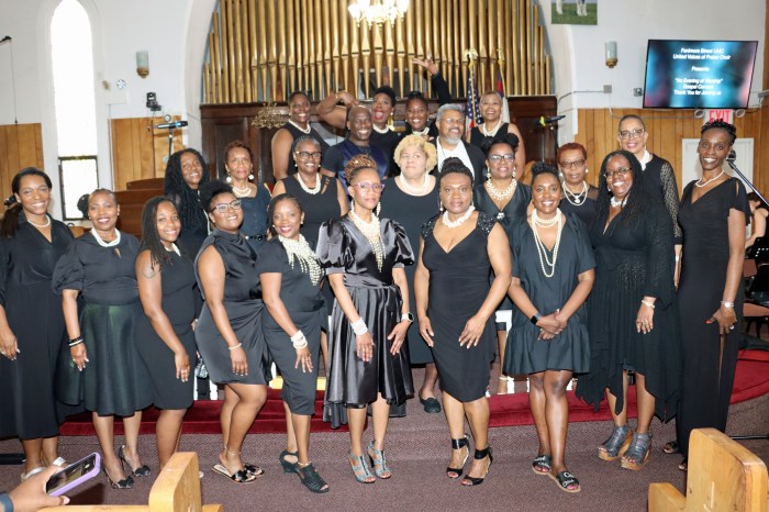 UVOP President Sophia Eversley, 6th from left, front row, with members at concert's end.