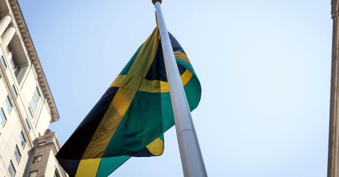 The Jamaica flag over Bowling Green in Manhattan after being hoisted in commemoration of the Island nation's 62nd Anniversary of Independence