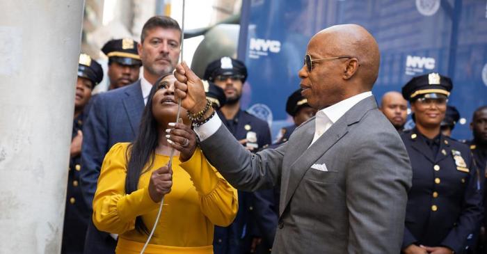 Consul General of Jamaica to New York, Alsion Wilson with Mayor Adams, center and Council Member Mercedes Narcisse far left at Jamaican flag raising to commemorate the Island nation's 62nd Anniversary of Independence at Bowling Green on Aug. 5.