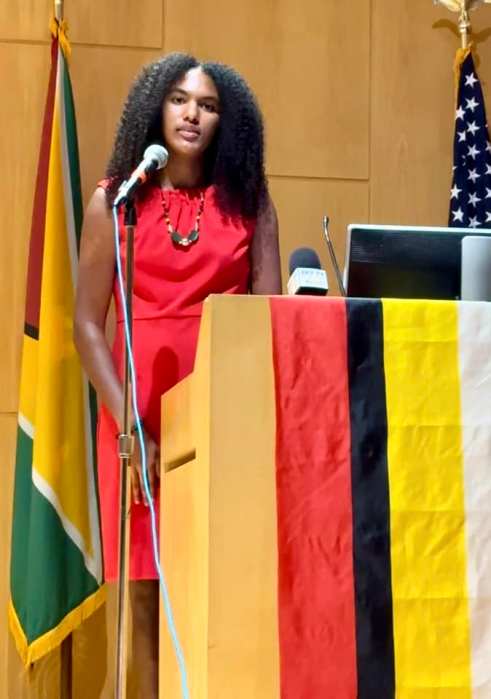 Young author Anaya Willabus, addresses the audience at an Emancipation Day Observance at Medgar Evers College on Juky 31, hosted by the Guyana Consulate. 