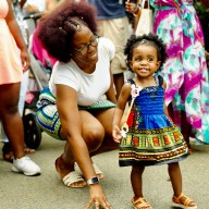 A mother and daughter pictured at a past Curl Fest celebration.