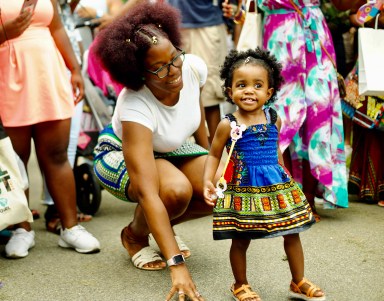 A mother and daughter pictured at a past Curl Fest celebration.