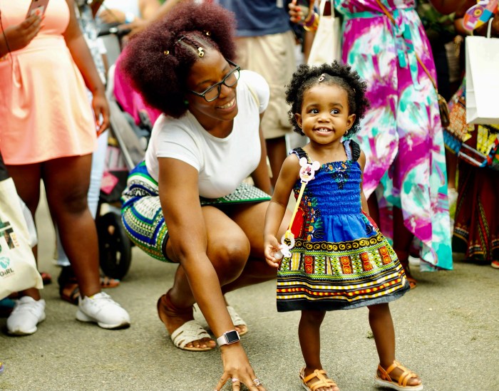 A mother and daughter pictured at a past Curl Fest celebration.