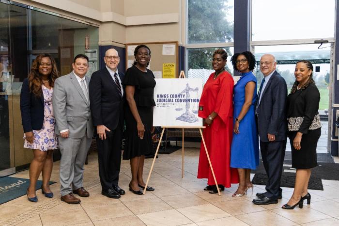 Brooklyn Democratic Party Chair Assemblywoman Rodneyse Bichotte Hermelyn, left, with Judicial nominees: Hon. Keisha Alleyne, Hon. Inga O’Neale, Hon. Christopher Robles, Hon. Adam D. Perlmutter, Hon. Lisa Lewis, Hon. Jeffrey Sunshine, and Hon. Sharen Hudson.