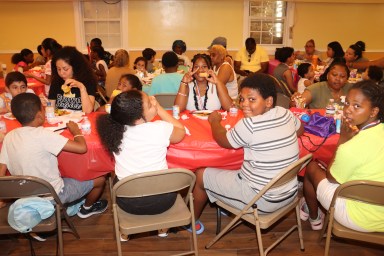 Homeless families having lunch