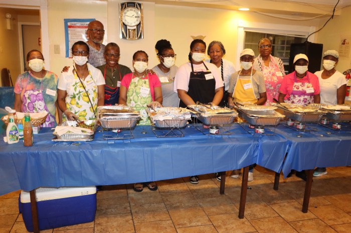 Marlene Ferguson, third from left, with members of the Family Life Committee preparing to serve lunch to homeless families